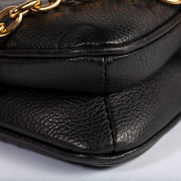 Authentic Louis Vuitton Black Monogram Empreinte Leather Liv Pochette - Picture 7 of 9